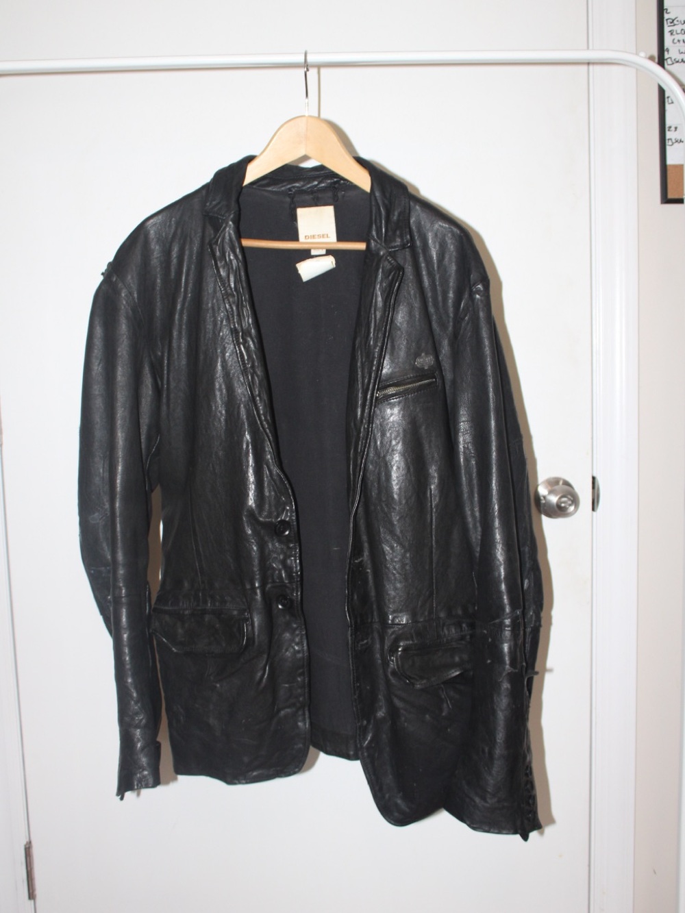 VINTAGE thrifted Diesel Men's Black Distressed Leather Jacket